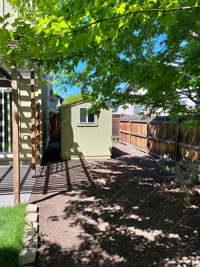 Building Photo - 3  BR home with new flooring in a great NE...