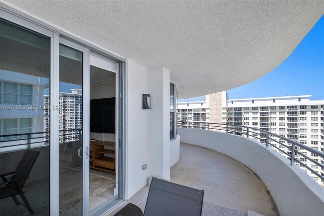 Building Photo - 5555 Collins Ave