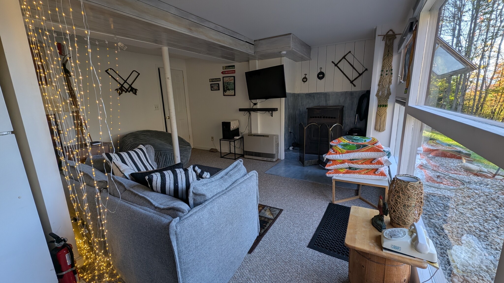 Living room with HD smart tv, wifi, antenna for broadcast stations, pellet stove backup heat - 221 Deans Mountain Rd