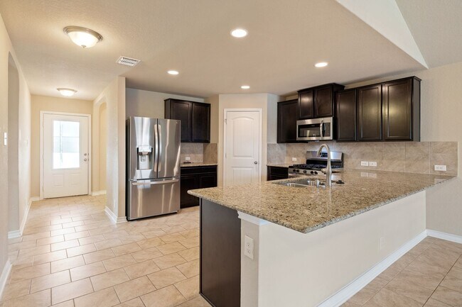 Building Photo - Spacious Redbird Ranch Home with Loft, Main Floor Primary Suite & Entertainer’s Deck