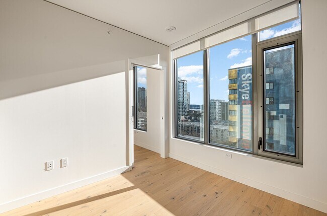 Building Photo - Urban Oasis at Spire Condominiums – Modern...