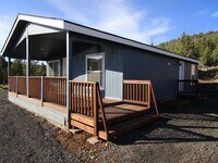 Building Photo - *APPLICATIONS PENDING* Brand New Manufactured Home - Water/Sewer/Electricity Provided!