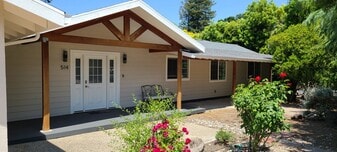 Main door with TREX Deck & Cedar Gables - 514 Osborn Ln