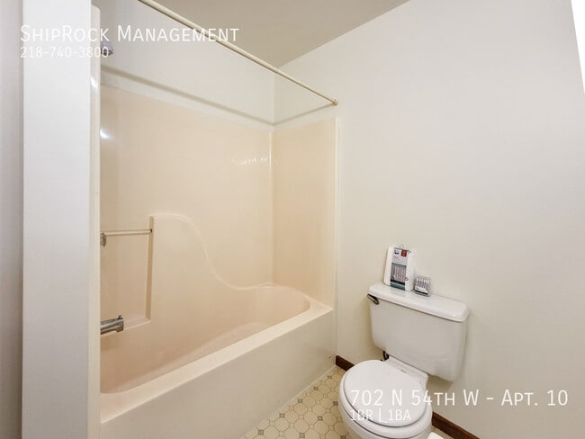 Building Photo - 702 N 54th Ave W