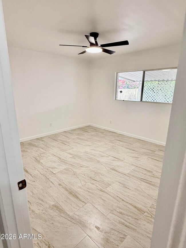 Building Photo - 5817 W Tierra Buena Ln