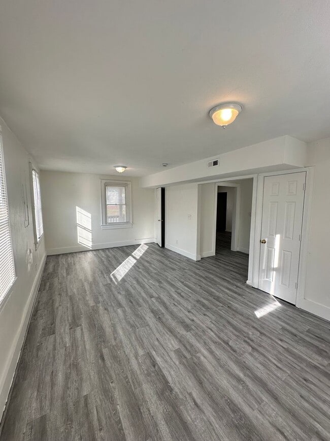 Building Photo - Three Bedroom Available Soon!