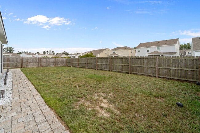 Building Photo - Spacious 5-Bedroom Home in The Palms at New Hampstead with Office & Screened Porch