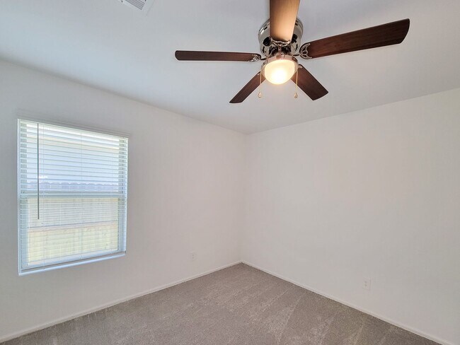 Building Photo - This single-story home has a comfortable layout with three bedrooms and a living area all on one ...