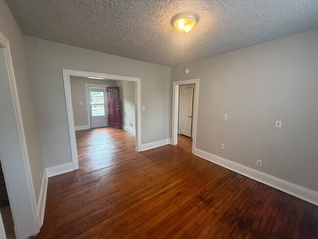 Building Photo - 2-bedroom 1 bathroom Cottage on a large lot with 2 large storage building on site