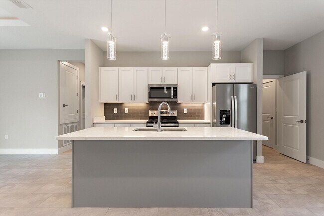 Building Photo - ONE MONTH FREE RENT! Modern, energy effici...