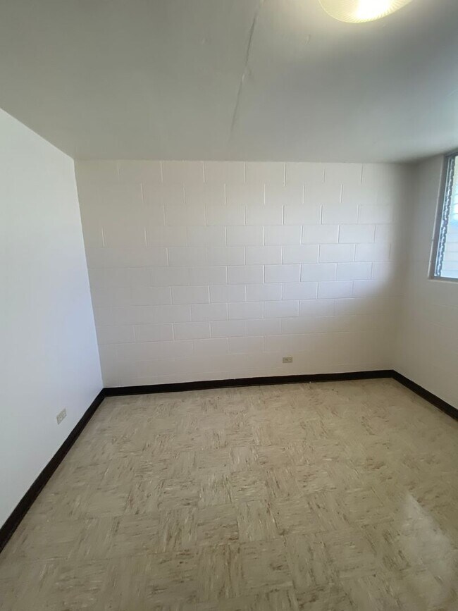 Building Photo - 1217/1223/1227 Kamaile Street