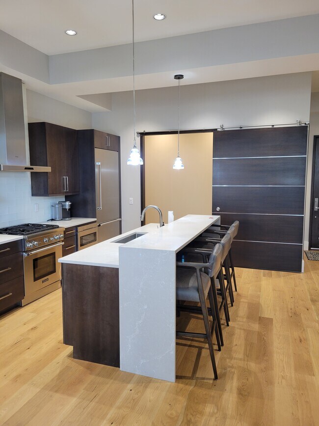 Office area beyond the island. This can be closed off with a large custom door - 300 W Main St