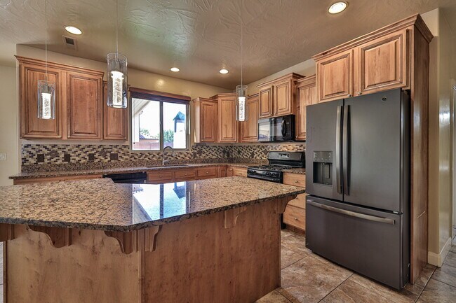 Building Photo - "Spacious 4-Bedroom Retreat with 3,584 Sq ...