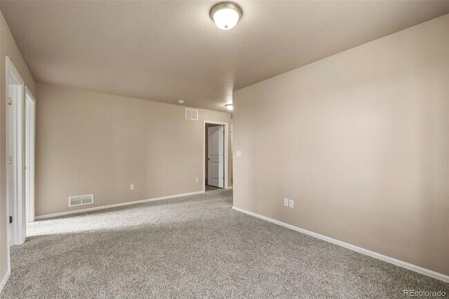 Building Photo - 7643 Sand Lake Heights