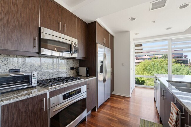 Building Photo - Luxury Corner Unit with Panoramic Mountain Views at Optima Camelview!