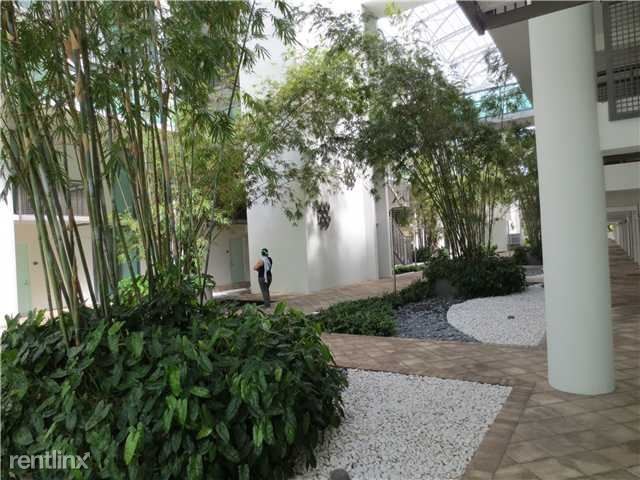 Building Photo - 2 br, 2.5 bath Condo - 6000 Collins Ave Go...