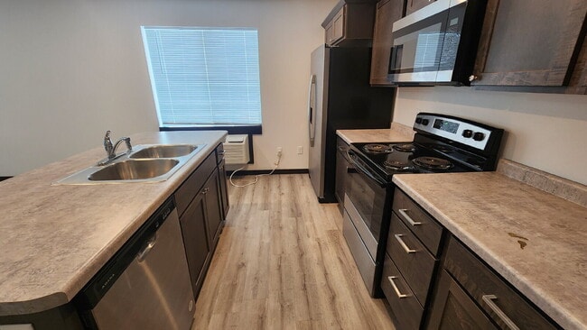 Building Photo - Available August 1st - Modern 2 Bedroom, 2 Full Bathroom with Garage