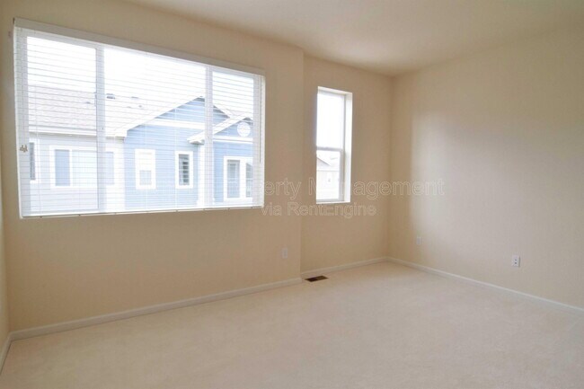 Building Photo - 15486 W 64th Ave