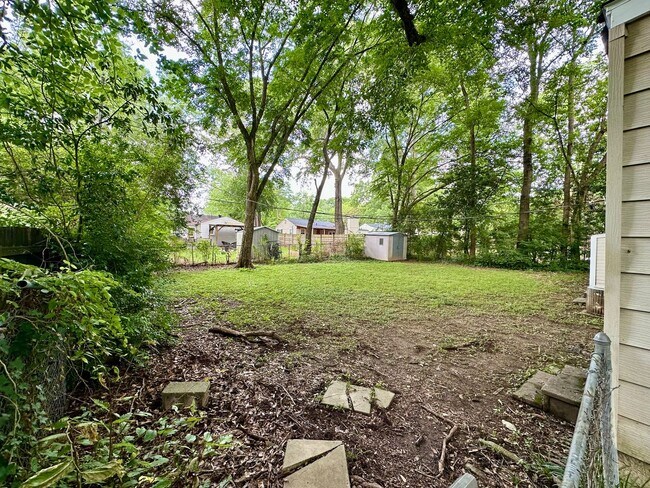 Building Photo - Charming Cottage situated on a nice lot in...
