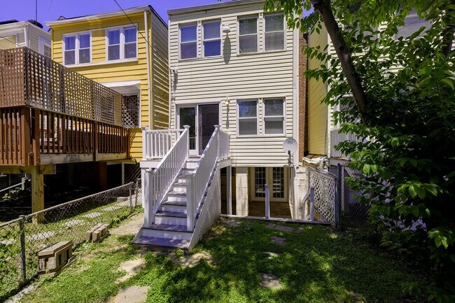 Building Photo - Charming & Renovated Petworth Rowhouse with Parking -  Available Now!