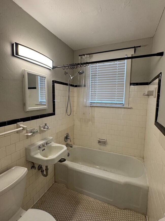 Building Photo - McQueen Street 4-plex - SMITK-LILY