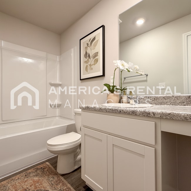 Building Photo - Stylish two level home with open concept l...