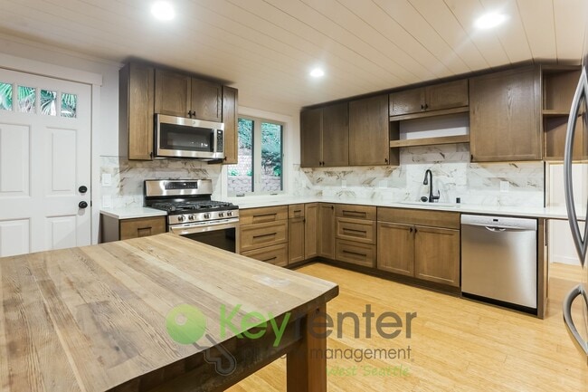 Building Photo - Modern 2-Bedroom Gem with Garage, Shed, an...