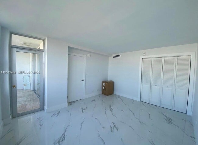 Building Photo - 6039 Collins Ave