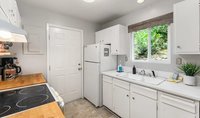 Building Photo - Tahoe City Retreat with Hot Tub, Huge Wraparound Deck & Walkable Access to Commons Beach