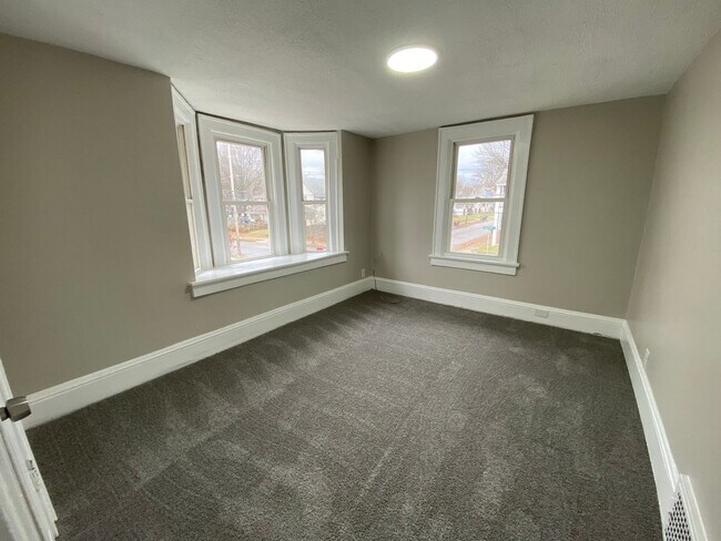 Building Photo - More Space Than You’d Expect: Updated 3BR w/ 1.5 Baths + Carpeted Attic Bonus