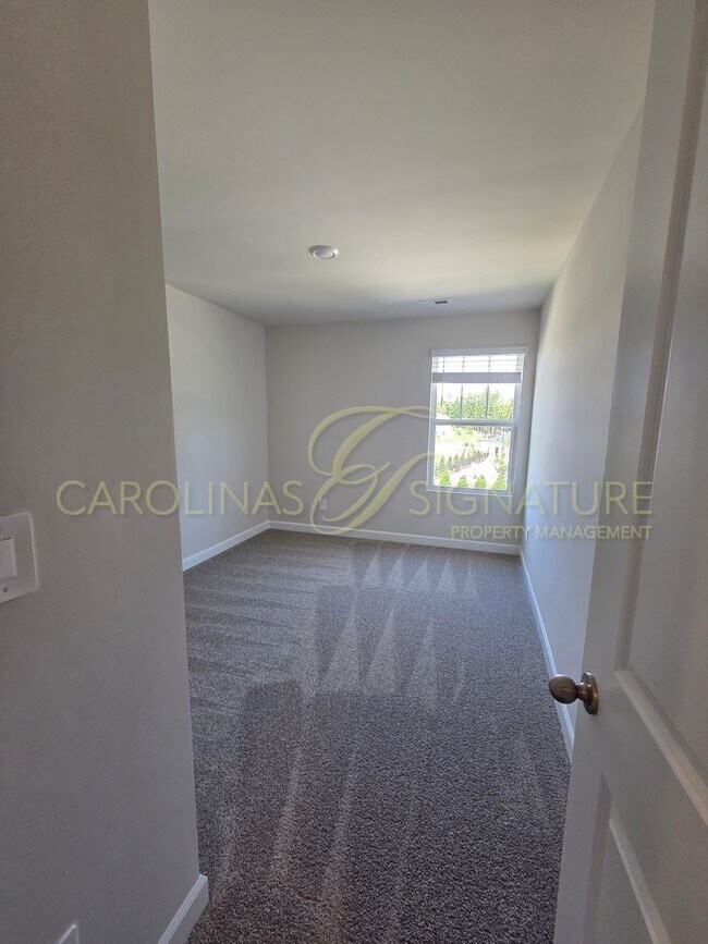 Building Photo - AVAILABLE SEPTEMBER 1! NEW CONSTRUCTION; 3...