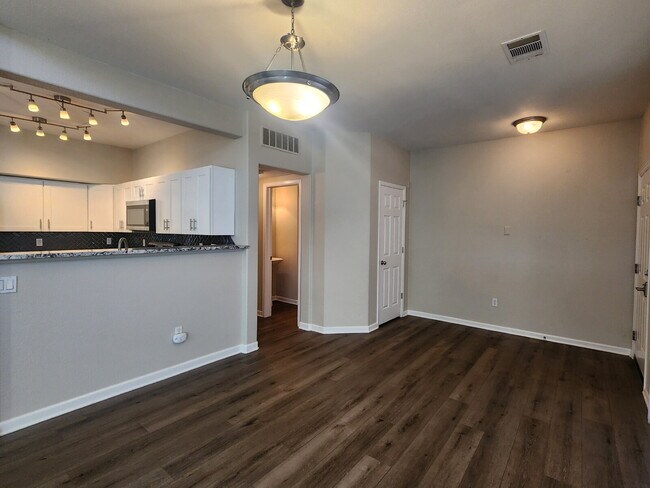 Building Photo - Spacious Two-Suite Townhome With Garage, Fireplace And Community Pool