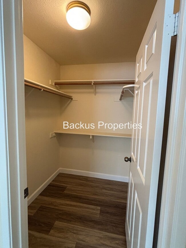 Building Photo - Very nice upstairs two bedroom condo in We...