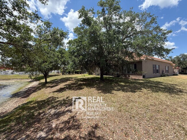 Building Photo - Executive Home with Custom Finishes in Gat...