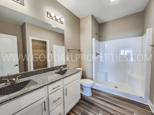 Building Photo - Spacious Waukee Ranch | 4 Bedrooms | 3-Car Garage | Finished Basement