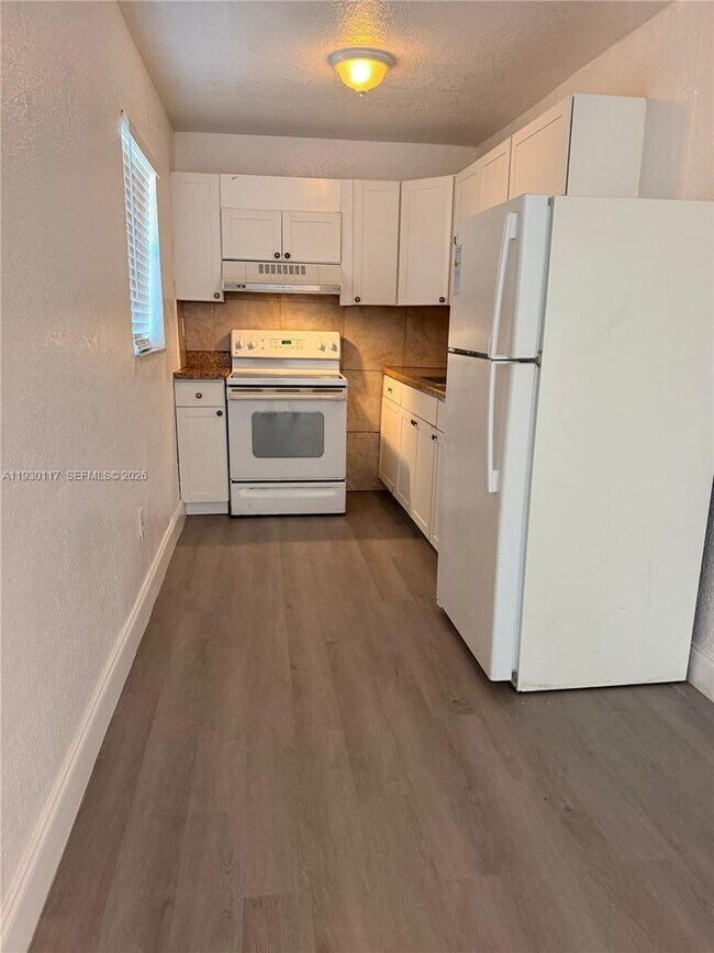 Building Photo - 1123 NW 27th Ave