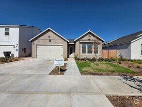 Building Photo - 3 bedroom 2 bathroom home with Solar and y...