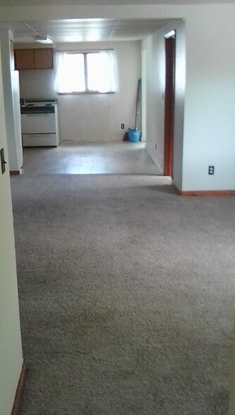 New carpeting throughout. Living room and both bedrooms - 663 court st
