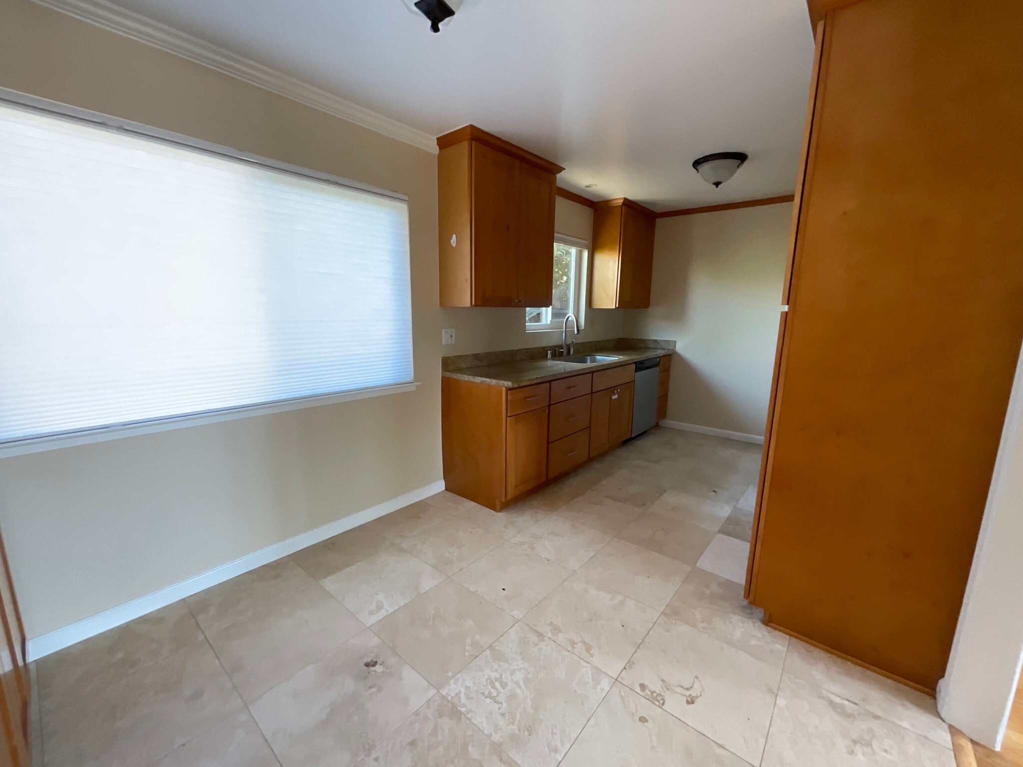 Kitchen sink, dishwasher and cabinets - 1822 Roosevelt Ave