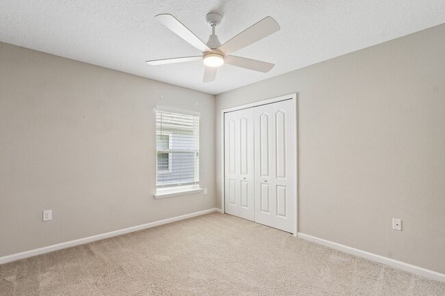 Building Photo - Modern 4BR Home with 3 Full Baths in River Glen | Screened Porch & Resort-Style Amenities