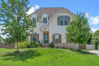 Building Photo - Elegant 4-Bedroom Home with Vaulted Ceilin...