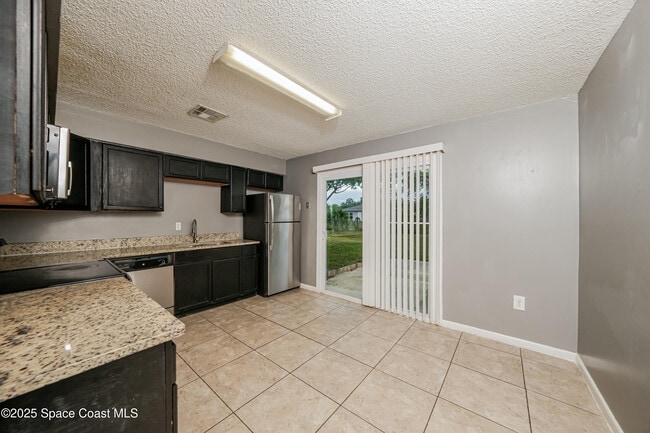 Building Photo - 7500 Coquina Ave