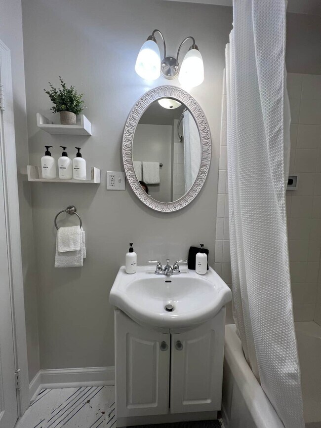 Bathroom with shower and tub - 9 N 6th St