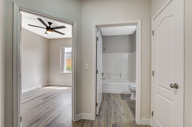 Building Photo - Upgraded First-Floor Condo in a Gated Summ...