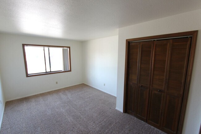 Building Photo - Bright 2BR Townhome in Boyington Heights | Private Balcony + Fenced Backyard