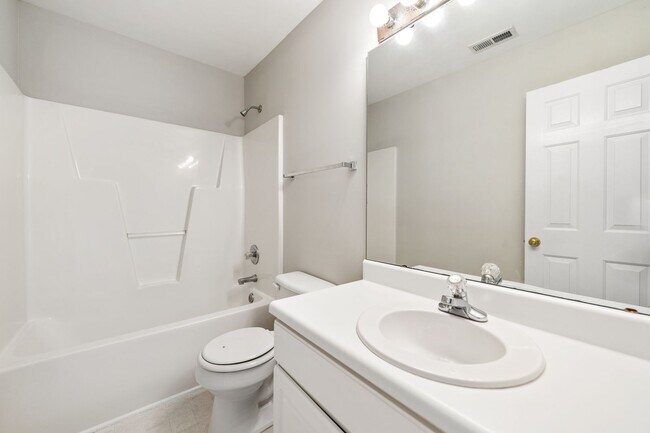 Building Photo - Available Early June! Renovated 3 bedroom 2.5 bath End Unit in NE Raleigh