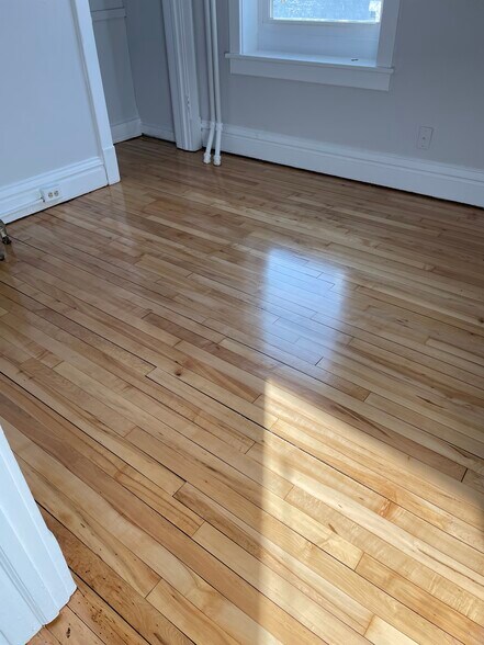 Side bedroom painted in subtle touch - 432 E 7th St