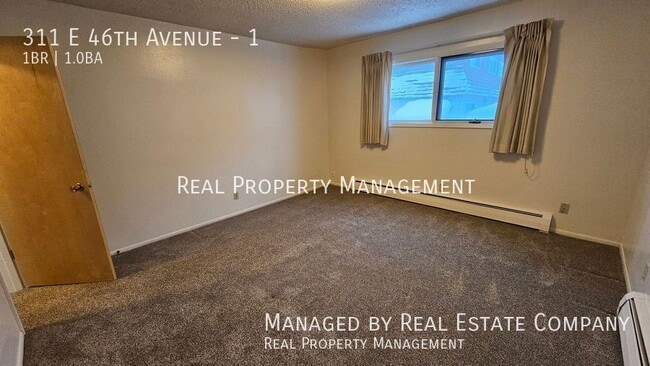 Building Photo - 311 E 46th Ave