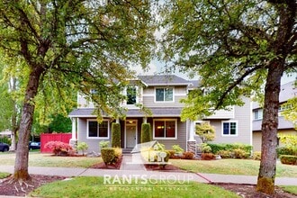 Building Photo - Stunning 4-Bedroom, 2.5 Bathroom Home on a...