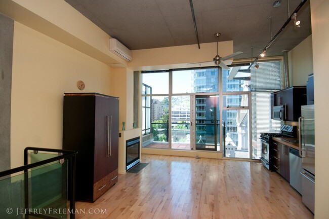 Building Photo - Stunning Penthouse Loft in the Mosaic Condos - Gas Fireplaces, A/C, W/D in unit!